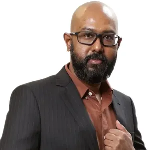 Dr. Arnil George Sirimanne